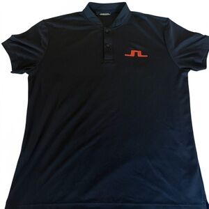 Men's navy blade golf polo with JL logo